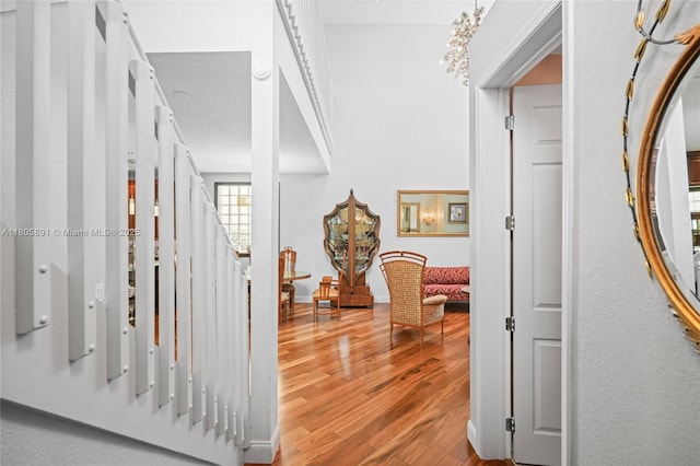 1282 Grant Ct, Hollywood, FL 33019 - corridor featuring wood finished floors and stairs