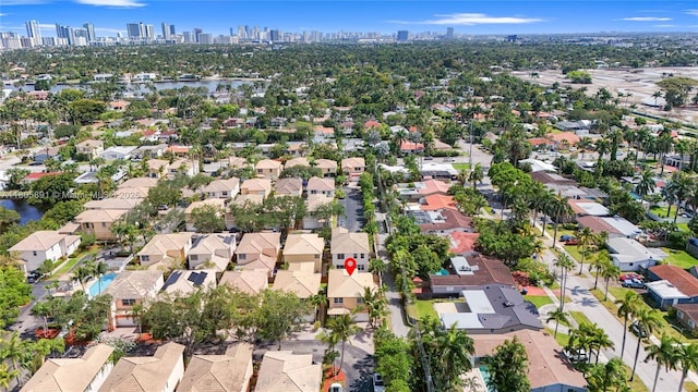 1282 Grant Ct, Hollywood, FL 33019 - aerial overview of property's location featuring skyline, nearby suburban area, and a large body of water
