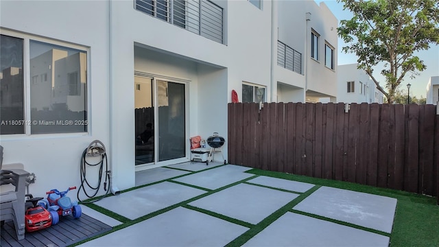 view of patio with fence