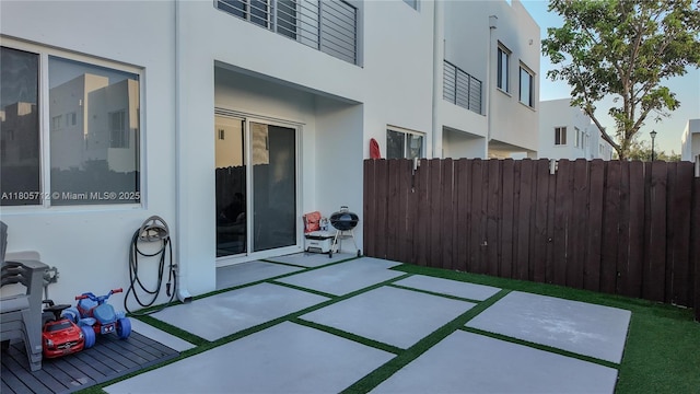 view of patio with fence