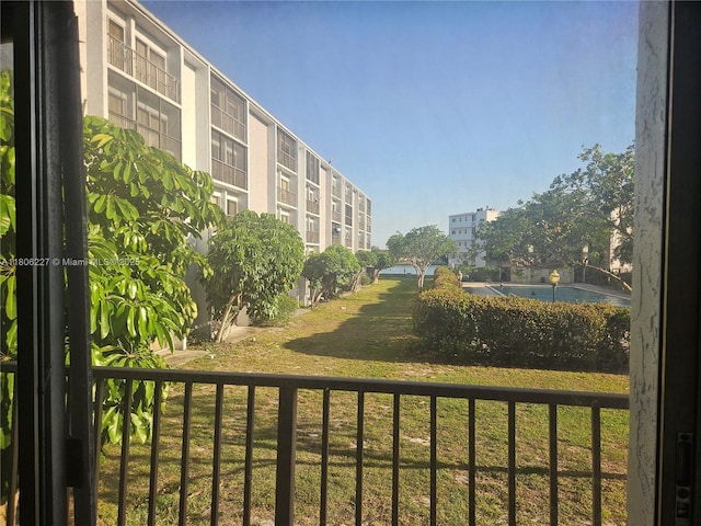8620 N Sherman Cir Unit 202, Miramar, FL 33025 - surrounding community featuring a lawn
