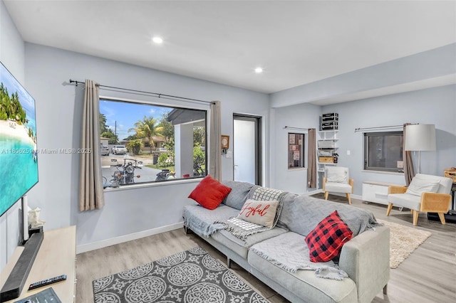 1635 NE 174th St, North Miami Beach, FL 33162 - living room featuring wood finished floors, recessed lighting, and baseboards