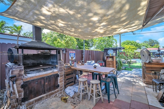 1635 NE 174th St, North Miami Beach, FL 33162 - view of patio with a gazebo and outdoor dining area
