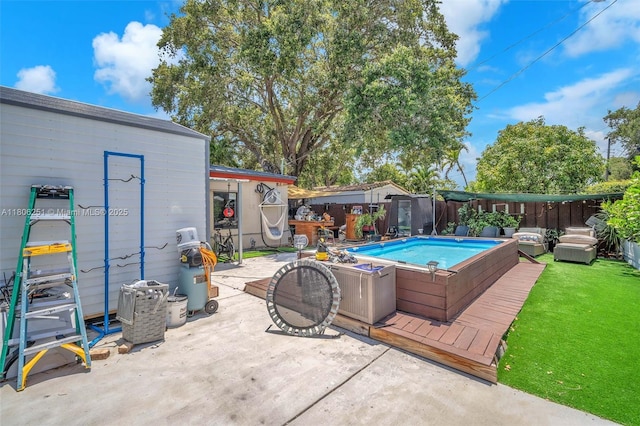 1635 NE 174th St, North Miami Beach, FL 33162 - view of swimming pool featuring a jacuzzi and an outbuilding