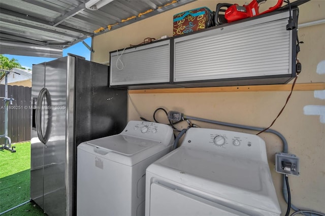 1635 NE 174th St, North Miami Beach, FL 33162 - laundry area featuring washing machine and clothes dryer