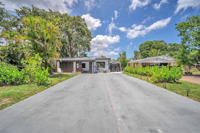 1635 NE 174th St, North Miami Beach, FL 33162 - view of front of property with driveway
