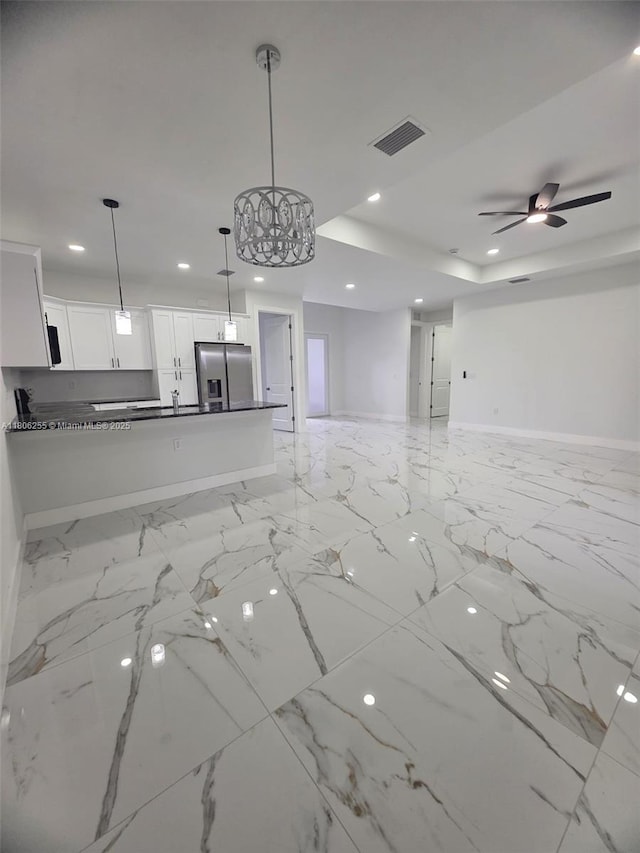 1145 SW Antonio St E, Lehigh Acres, FL 33974 - unfurnished living room featuring recessed lighting, a ceiling fan, and light marble finish floors