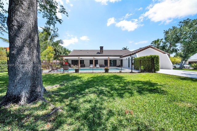 11850 SW 42nd Ct, Davie, FL 33330 - back of property featuring a chimney