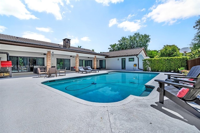 11850 SW 42nd Ct, Davie, FL 33330 - view of swimming pool featuring ceiling fan and a patio