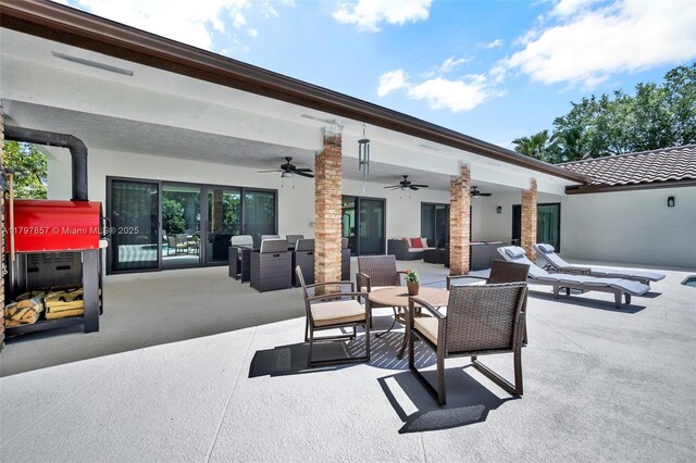 11850 SW 42nd Ct, Davie, FL 33330 - view of patio with ceiling fan and outdoor lounge area