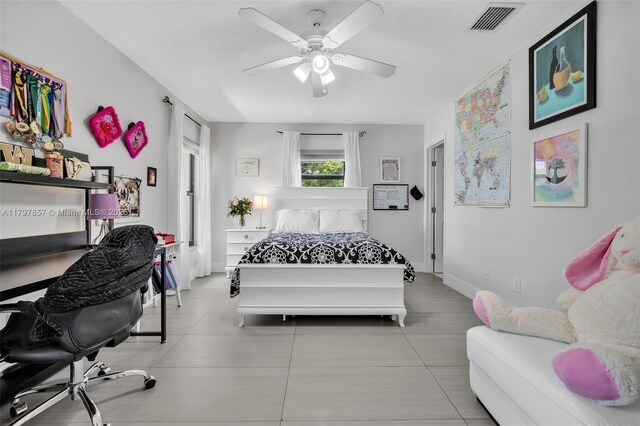 11850 SW 42nd Ct, Davie, FL 33330 - bedroom featuring ceiling fan, tile patterned flooring, and baseboards