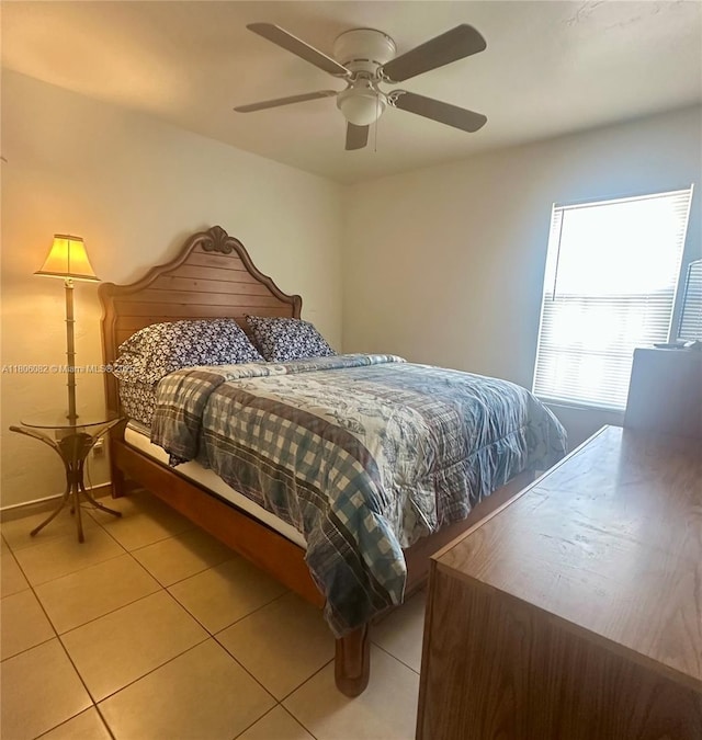 2804 26th SW, Lehigh Acres, FL 33976 - bedroom with light tile patterned floors and a ceiling fan
