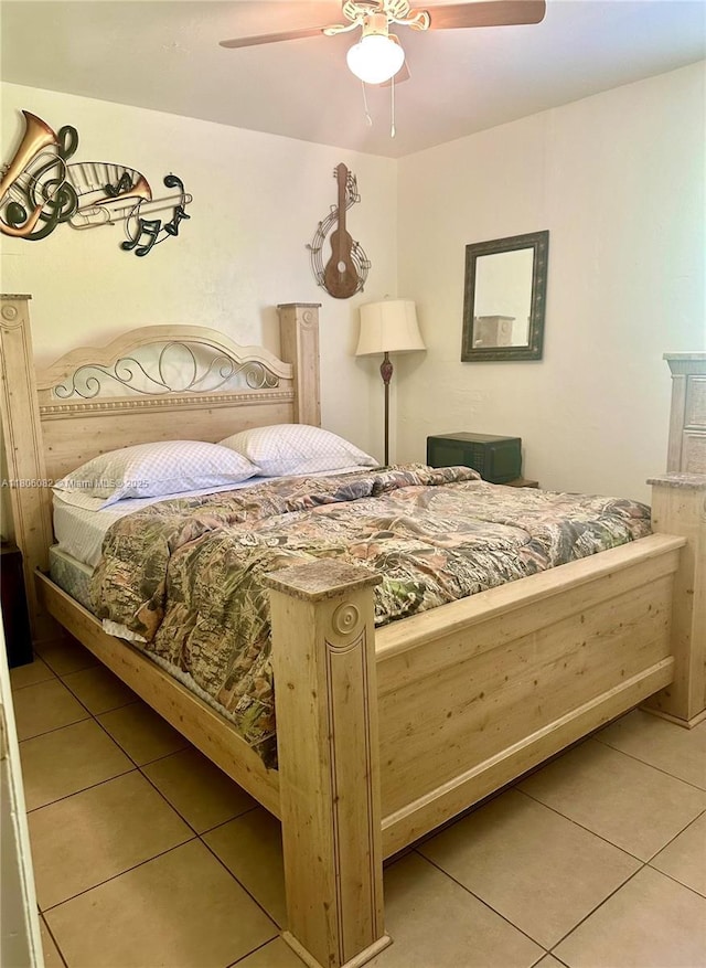 2804 26th SW, Lehigh Acres, FL 33976 - bedroom featuring light tile patterned flooring and ceiling fan