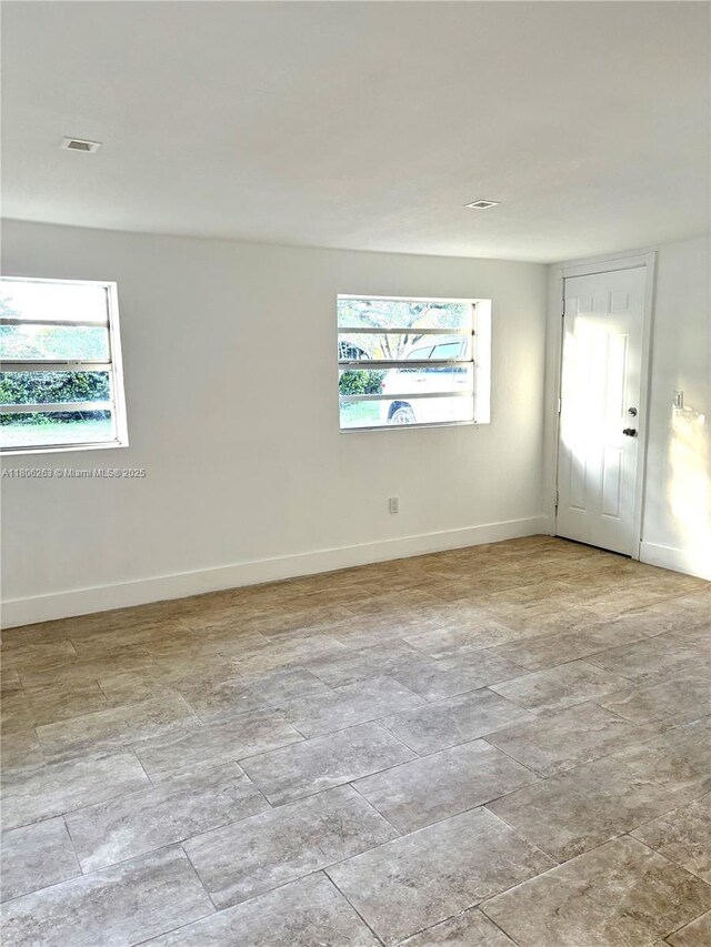 1416 SW 33ct, Fort Lauderdale, FL 33315 - unfurnished room with baseboards