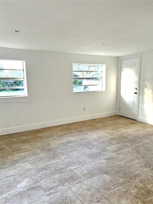 1416 SW 33ct, Fort Lauderdale, FL 33315 - spare room featuring baseboards