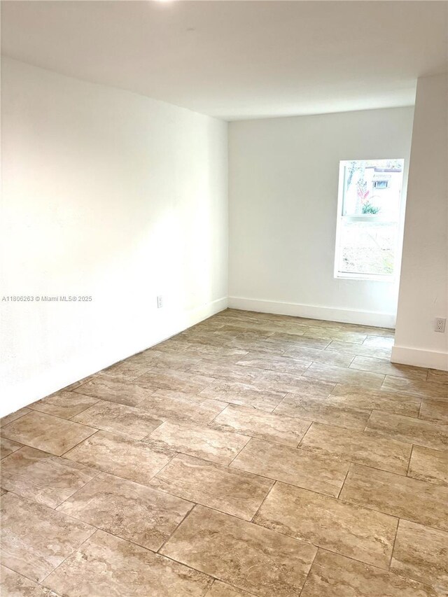 1416 SW 33ct, Fort Lauderdale, FL 33315 - spare room featuring baseboards