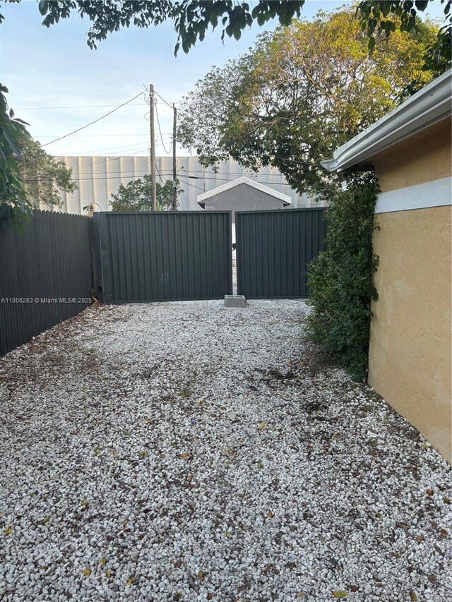 1416 SW 33ct, Fort Lauderdale, FL 33315 - view of yard featuring a gate