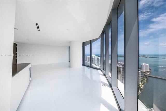 300 Biscayne Boulevard Way Unit 4507W, Miami, FL 33131 - unfurnished room with a water view, expansive windows, and light tile patterned floors
