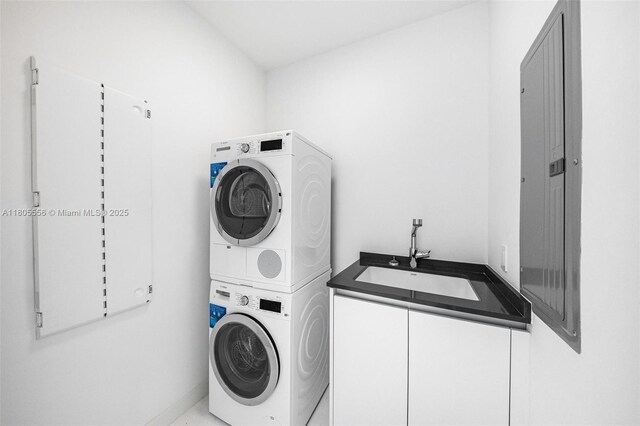 300 Biscayne Boulevard Way Unit 4507W, Miami, FL 33131 - washroom with stacked washer and clothes dryer and cabinet space