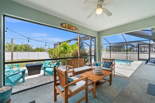 7434 Ashtabula St, Englewood, FL 34224 - sunroom / solarium featuring a ceiling fan and an outdoor living space