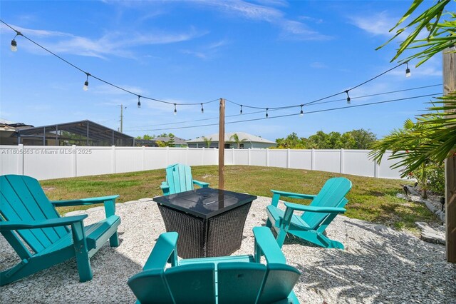 7434 Ashtabula St, Englewood, FL 34224 - view of patio / terrace with an outdoor fire pit