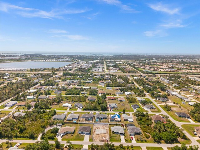 7434 Ashtabula St, Englewood, FL 34224 - aerial view of property and surrounding area featuring a large body of water and nearby suburban area