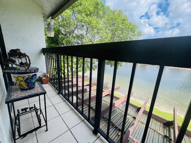 1271 SW 124th Ct Unit 2-D, Miami, FL 33184 - balcony featuring a water view