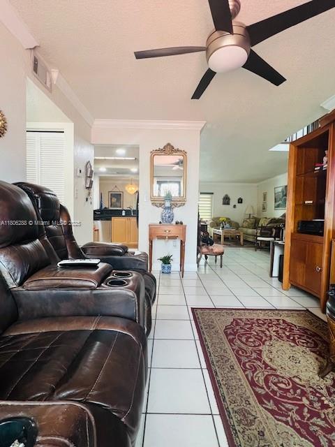1271 SW 124th Ct Unit 2-D, Miami, FL 33184 - living area with ceiling fan, light tile patterned flooring, and ornamental molding