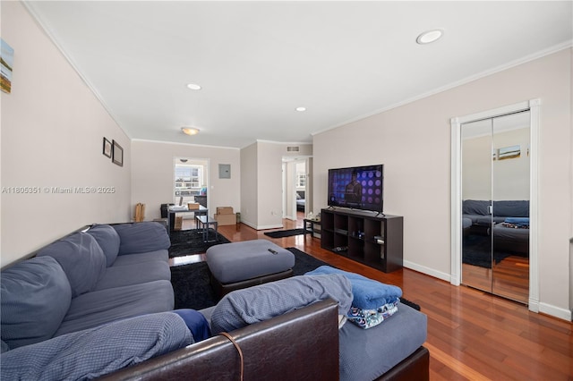 462 Golden Isles Dr Unit 305, Hallandale Beach, FL 33009 - living room featuring ornamental molding, wood finished floors, recessed lighting, and baseboards