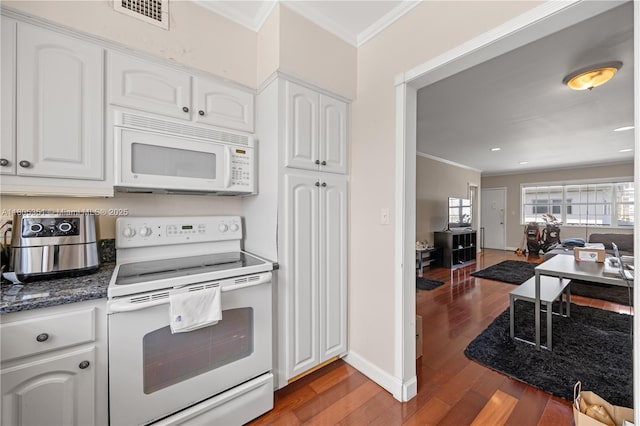 462 Golden Isles Dr Unit 305, Hallandale Beach, FL 33009 - kitchen featuring white appliances, ornamental molding, white cabinetry, wood finished floors, and baseboards