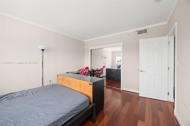 462 Golden Isles Dr Unit 305, Hallandale Beach, FL 33009 - bedroom featuring dark wood-style flooring, crown molding, and baseboards