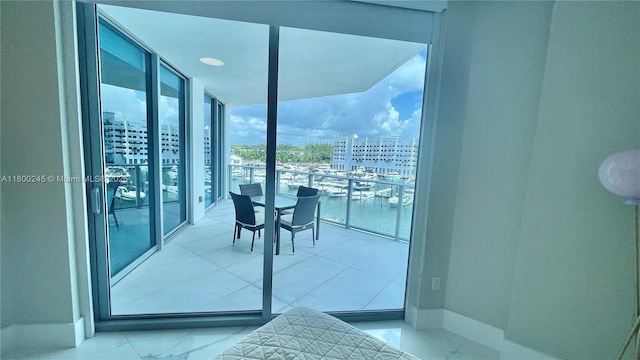 17111 Biscayne Blvd Unit 403, North Miami Beach, FL 33160 - balcony featuring a water view and view of marina