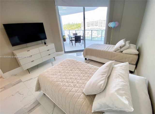 17111 Biscayne Blvd Unit 403, North Miami Beach, FL 33160 - bedroom with access to exterior and marble look tiles