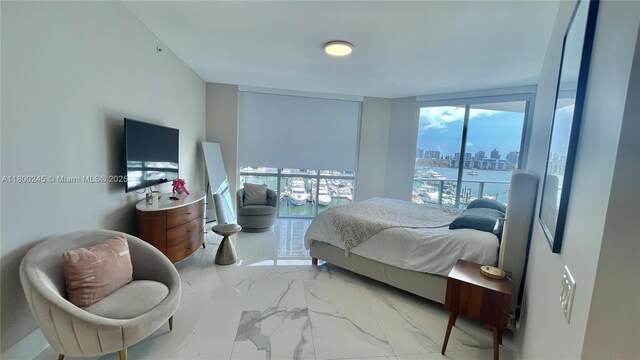 17111 Biscayne Blvd Unit 403, North Miami Beach, FL 33160 - bedroom with marble finish flooring and multiple windows