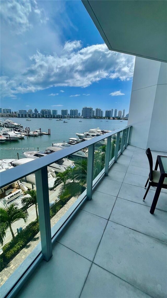 17111 Biscayne Blvd Unit 403, North Miami Beach, FL 33160 - balcony featuring a view of skyline and a water view