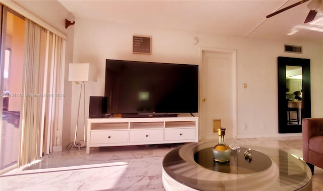 3905 N Nob Hill Rd Unit 510, Sunrise, FL 33351 - living room featuring ceiling fan and marble finish flooring