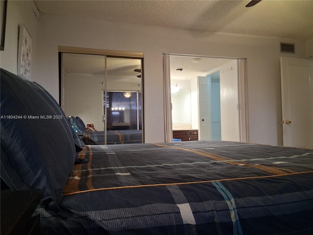 3905 N Nob Hill Rd Unit 510, Sunrise, FL 33351 - bedroom featuring a closet and a textured ceiling