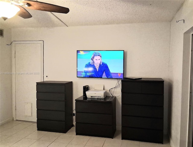 3905 N Nob Hill Rd Unit 510, Sunrise, FL 33351 - living room featuring ceiling fan, light tile patterned floors, and a textured ceiling