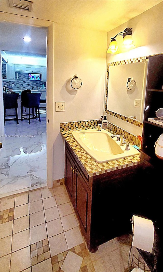 3905 N Nob Hill Rd Unit 510, Sunrise, FL 33351 - bathroom featuring vanity and baseboards
