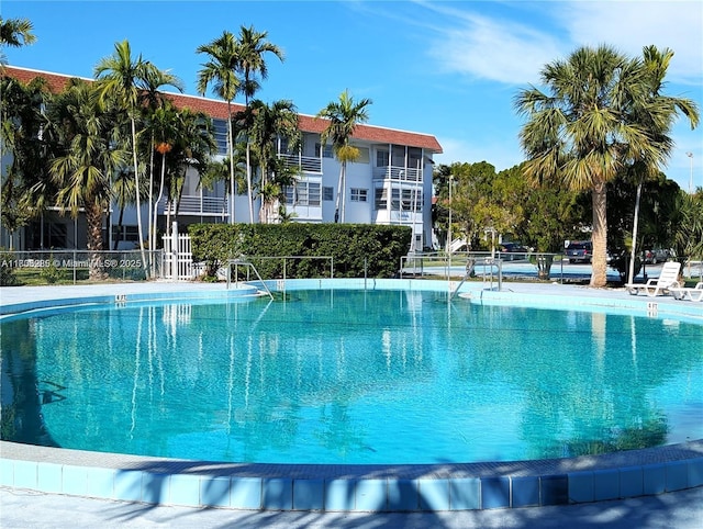 1280 NW 43rd Ave Unit 205, Lauderhill, FL 33313 - community pool featuring fence
