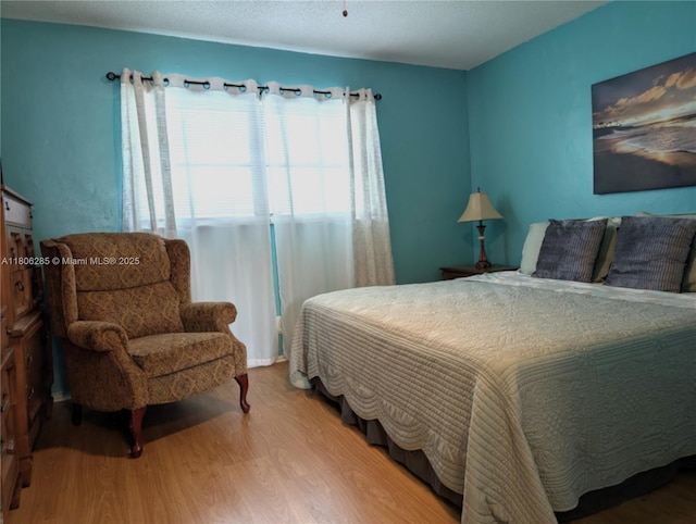1280 NW 43rd Ave Unit 205, Lauderhill, FL 33313 - bedroom with wood finished floors