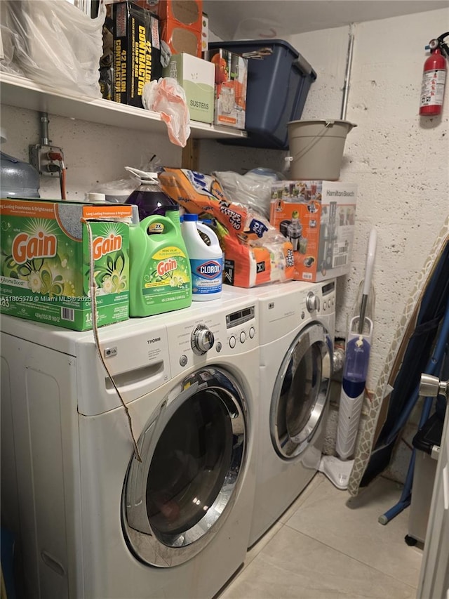 6626 SW 1st Ct, Pembroke Pines, FL 33023 - laundry area with tile patterned floors and washing machine and clothes dryer