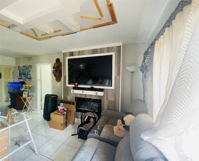 17101 NW 57th Ave Unit 314, Miami Gardens, FL 33055 - living room with light tile patterned flooring and a glass covered fireplace