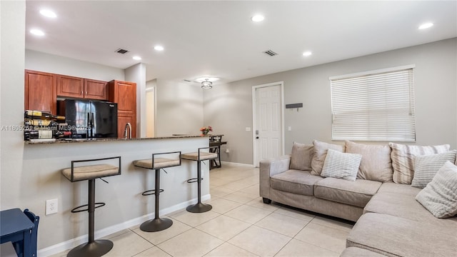2801 SW 81st Ter, Miramar, FL 33025 - living area with recessed lighting, light tile patterned floors, and baseboards