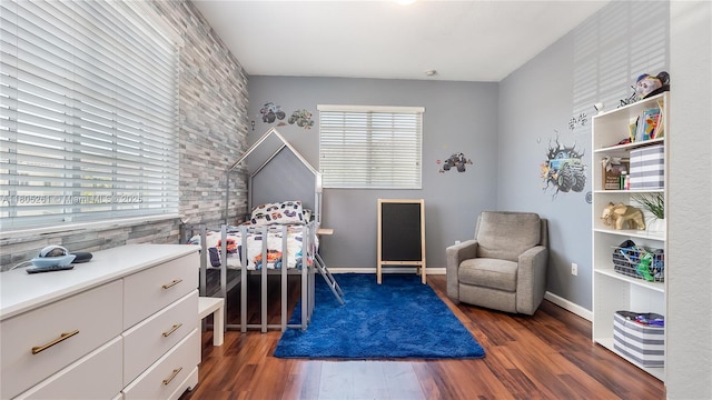 2801 SW 81st Ter, Miramar, FL 33025 - bedroom featuring multiple windows, wood finished floors, and baseboards
