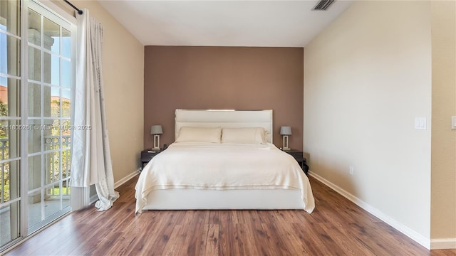 2801 SW 81st Ter, Miramar, FL 33025 - bedroom with wood finished floors, multiple windows, and baseboards