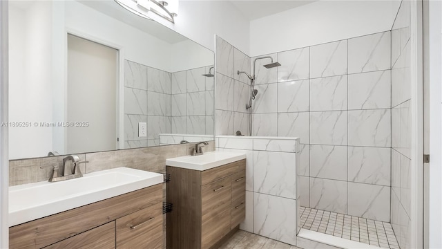 2801 SW 81st Ter, Miramar, FL 33025 - bathroom with tile walls, a walk in shower, and two vanities