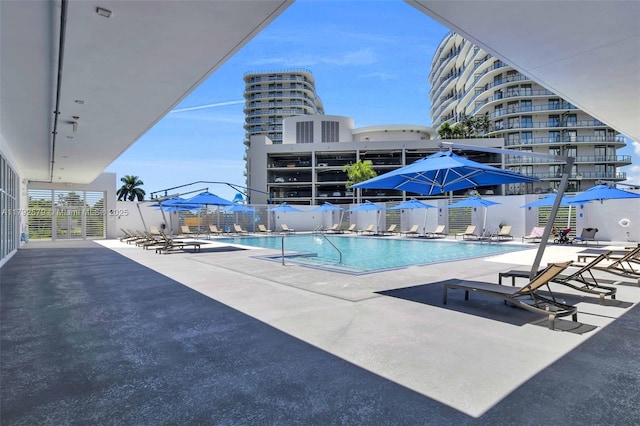 14951 Royal Oaks Ln Unit 2105, North Miami, FL 33181 - community pool with a patio area