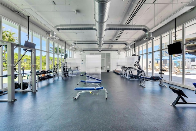 14951 Royal Oaks Ln Unit 2105, North Miami, FL 33181 - exercise room featuring a high ceiling
