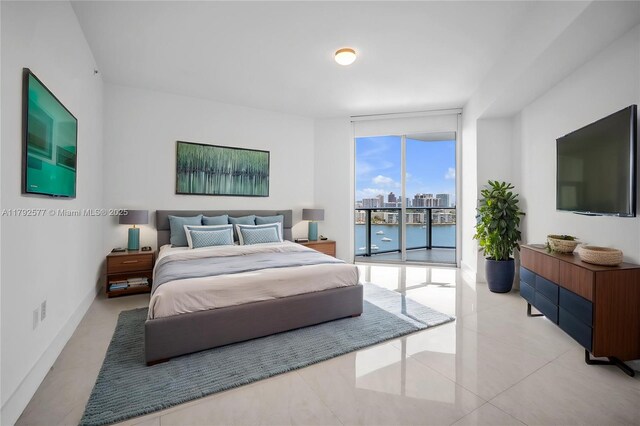 17301 Biscayne Blvd Unit 1108, Aventura, FL 33160 - bedroom with expansive windows, access to exterior, and light tile patterned floors